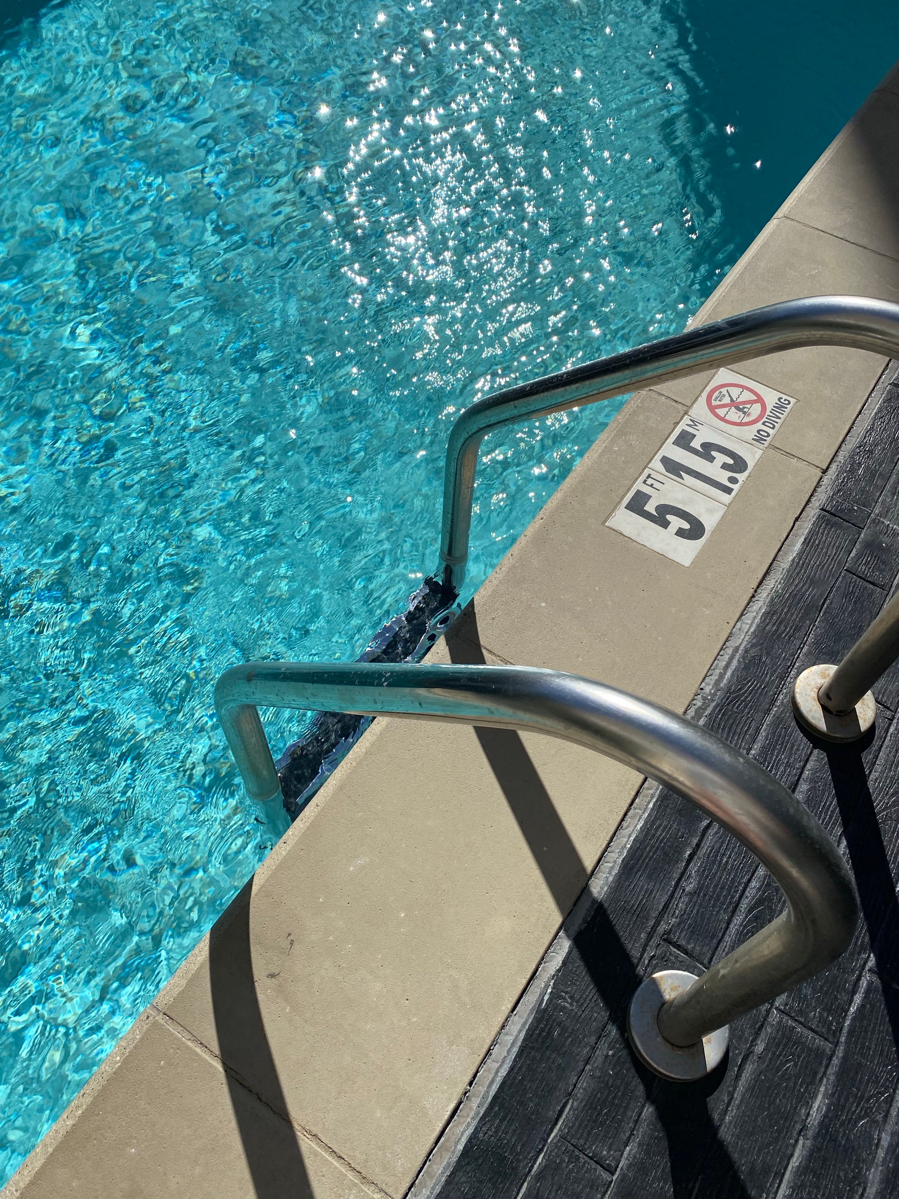 Beautiful swimming pool with clear blue water
